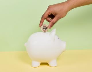 Coin into piggy bank pension scheme savings